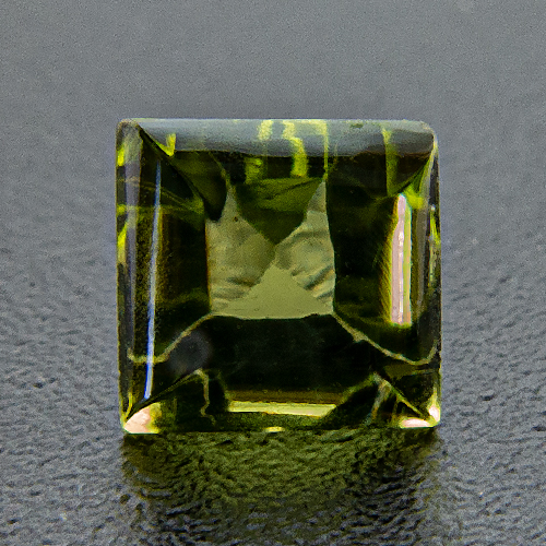 Peridot. 1 Piece. Bufftop Square, very very small inclusions