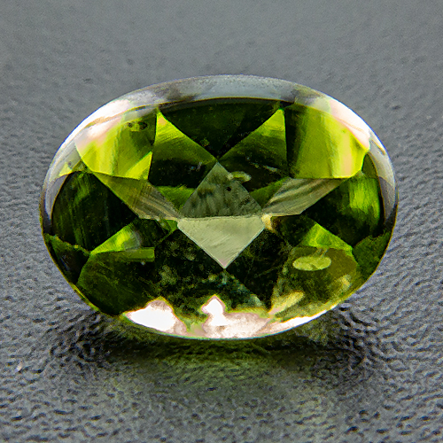 Peridot. 1 Piece. Bufftop Oval, very small inclusions