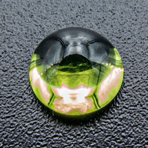Peridot. 1 Piece. Cabochon Round, very small inclusions