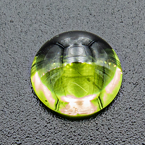 Peridot from Myanmar. 1 Piece. Cabochon Round, small inclusions