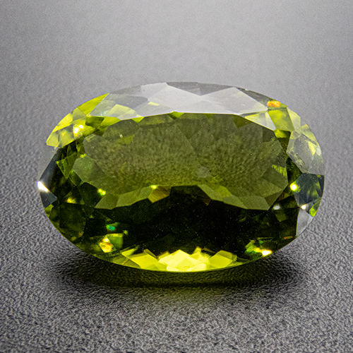 Peridot from Pakistan. 5.68 Carat. Oval, small inclusions