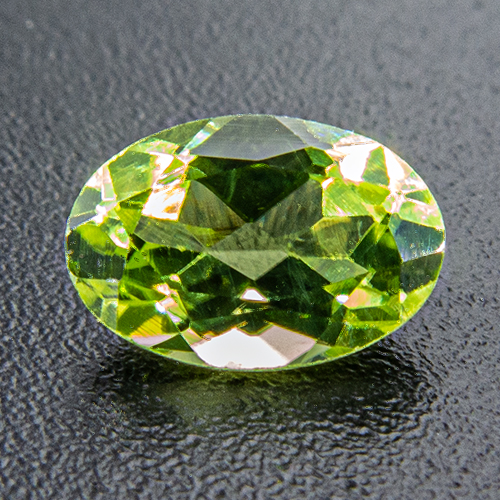 Peridot from Brazil. 1 Piece. Oval, very small inclusions