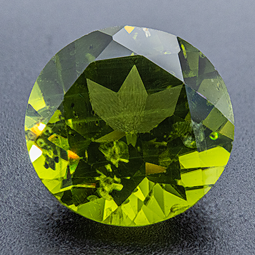Peridot from China. 10.06 Carat. Round, small inclusions