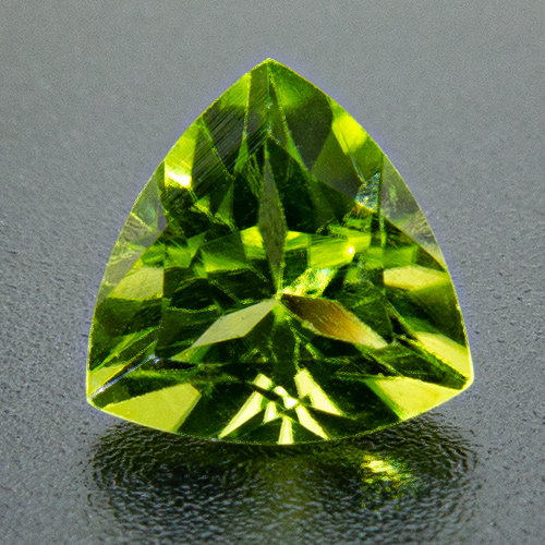 Peridot from China. 1 Piece. Trillion, very small inclusions