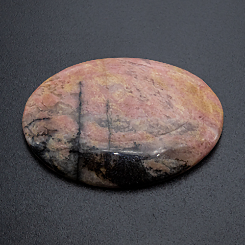 Rhodonite from Australia. 1 Piece. Cabochon Oval, opaque