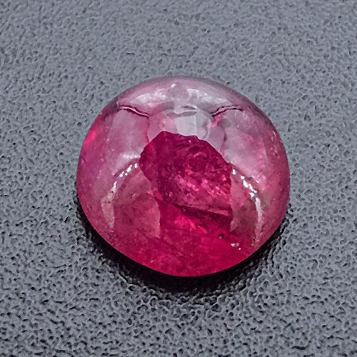 Ruby from Greenland. 1.28 Carat. Cabochon Round, very, very distinct inclusions