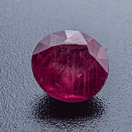 Ruby from Greenland. 0.78 Carat. Round, very, very distinct inclusions