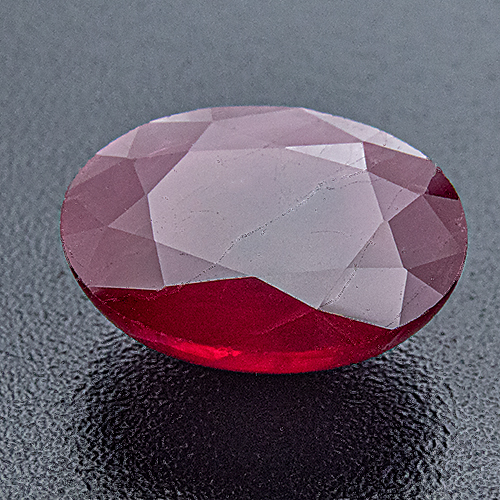 Ruby from Myanmar. 3.5 Carat. One side facetted, the other cut "en cabochon", can be set and worn both sides up.
