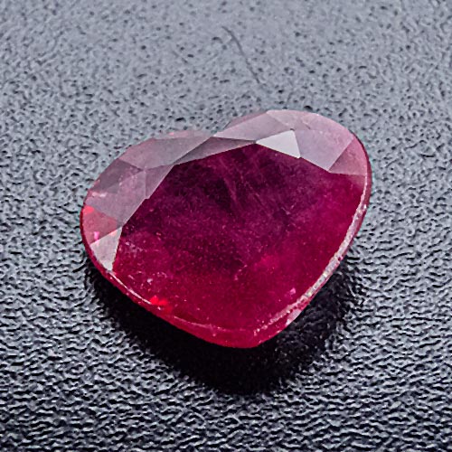 Ruby from Mozambique. 0.95 Carat. Very shallow cut ruby heart, looks heavier and thus much more expensive than it is