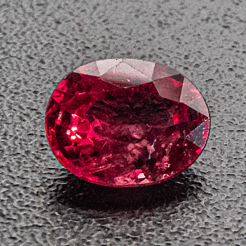 Ruby from Mozambique. 1 Piece. Oval, distinct inclusions