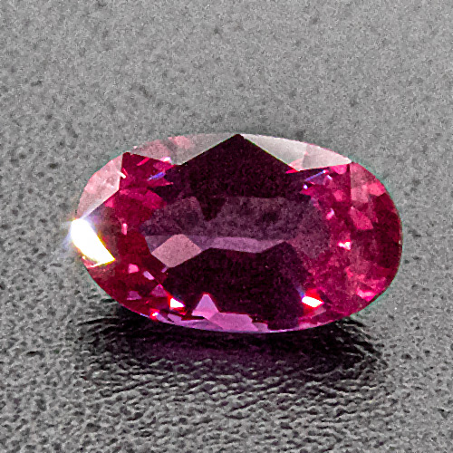 Ruby from Mozambique. 1 Piece. Oval, very distinct inclusions