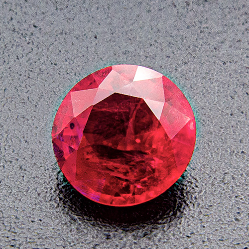 Ruby from Mozambique. 0.81 Carat. Round, very distinct inclusions