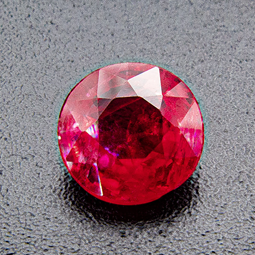 Ruby from Mozambique. 0.85 Carat. Round, very distinct inclusions
