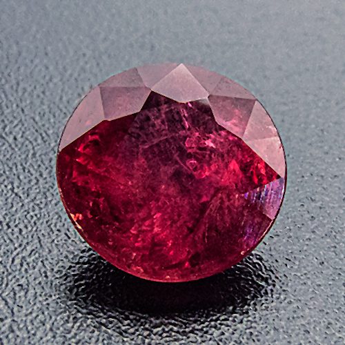 Ruby from Mozambique. 1.18 Carat. Round, very distinct inclusions