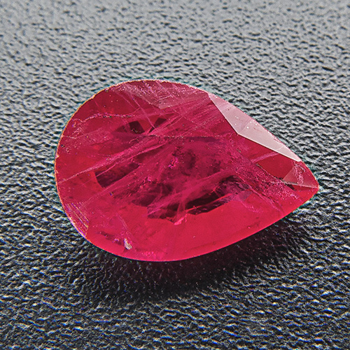 Ruby from Myanmar. 1 Piece. Pear, very, very distinct inclusions