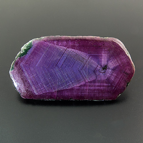 Trapiche Ruby from India. 28.61 Carat. Unusually large and fine trapiche ruby whose pattern resembles a comet with tail