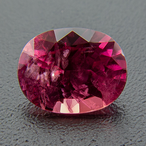 Ruby. 0.41 Carat. Oval, very distinct inclusions