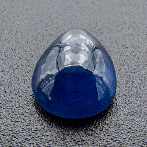 Sapphire from Thailand. 1 Piece. Cabochon Pear, very distinct inclusions
