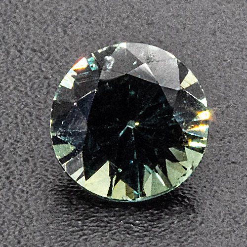 Teal sapphire from Australia. 0.43 Carat. Small chip at tip of pavilion