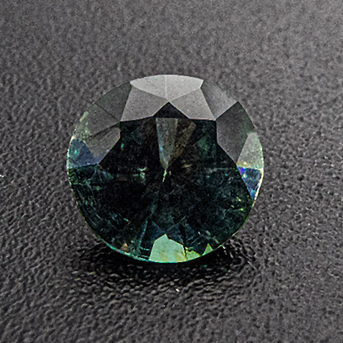 Teal sapphire from Australia. 0.41 Carat. Very slight asymmetry can be hidden in bezel setting