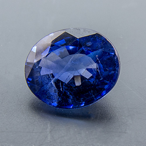 Sapphire. 0.58 Carat. Oval, distinct inclusions