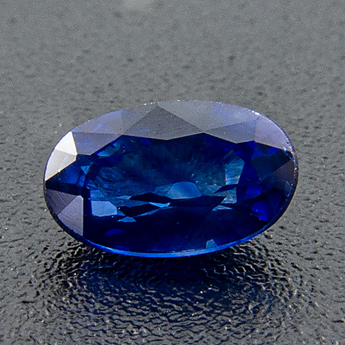Sapphire. 1 Piece. Oval, distinct inclusions