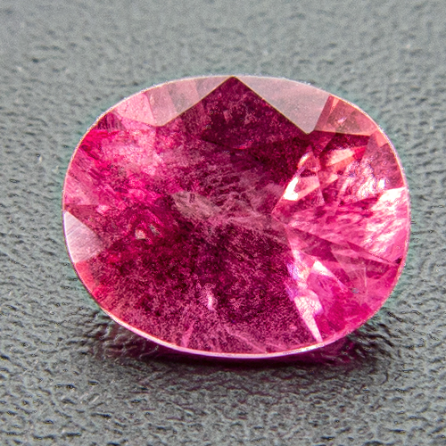 Pink sapphire from Vietnam. 0.54 Carat. Oval, very distinct inclusions
