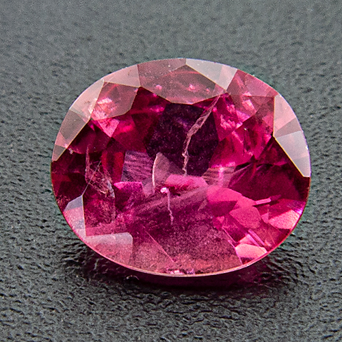 Pink sapphire from Vietnam. 0.63 Carat. Oval, very distinct inclusions