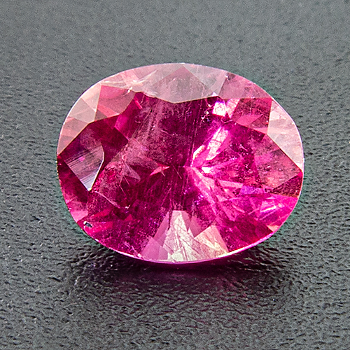 Pink sapphire from Vietnam. 0.78 Carat. Oval, very distinct inclusions