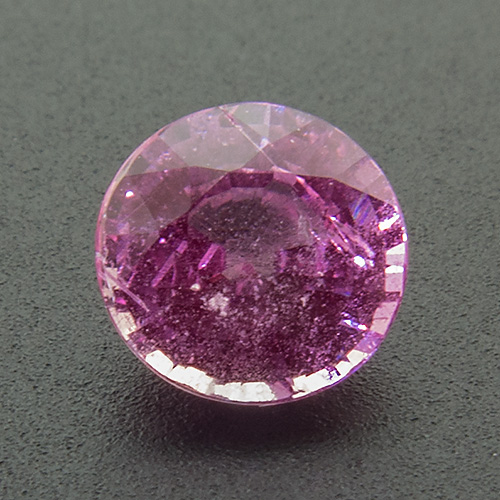 Pink Sapphire from Sri Lanka. 0.77 Carat. Round, distinct inclusions