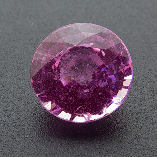 Pink Sapphire from Sri Lanka. 0.87 Carat. Round, distinct inclusions