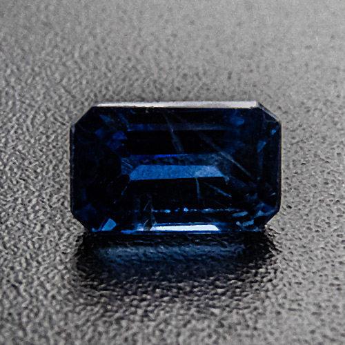 Sapphire from Thailand. 0.64 Carat. Emerald Cut, distinct inclusions