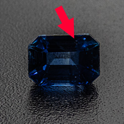 Sapphire from Thailand. 0.65 Carat. Sports a surface reaching inclusion