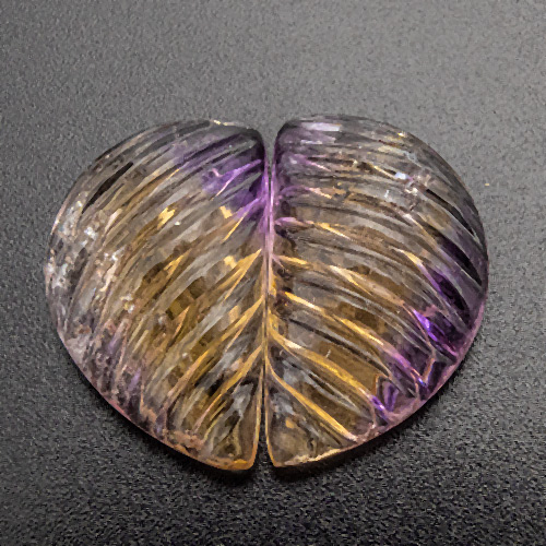 Ametrine from Bolivia. 28.07 Carat. Handcarved in India in the early 1980ies