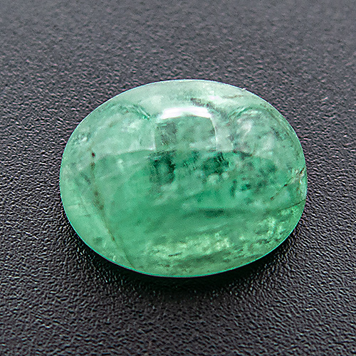 Emerald from Brazil. 6.69 Carat. Cabochon Oval, translucent