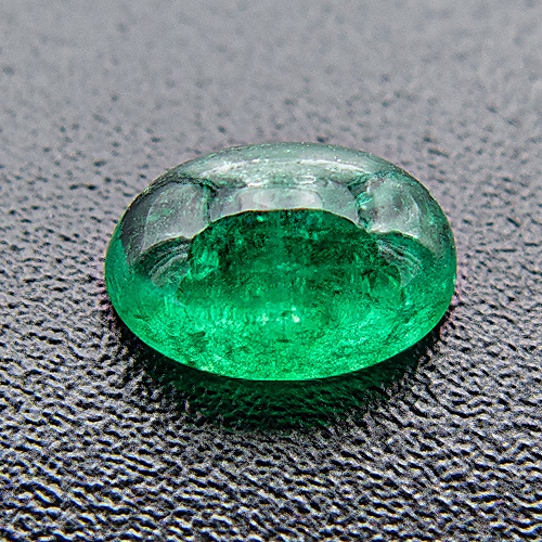 Emerald from Brazil. 1 Piece. Cabochon Oval, very distinct inclusions