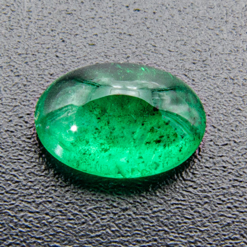 Emerald from Brazil. 1 Piece. Cabochon Oval, very, very distinct inclusions