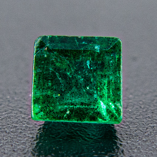 Emerald from Brazil. 0.3 Carat. Square, very distinct inclusions