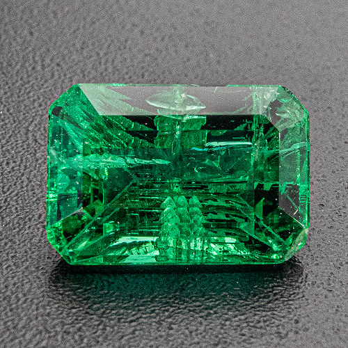 Emerald from Zambia. 1.44 Carat. Emerald Cut, distinct inclusions