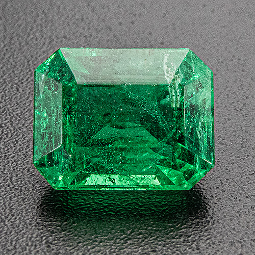 Emerald from Zambia. 1.53 Carat. Emerald Cut, very distinct inclusions