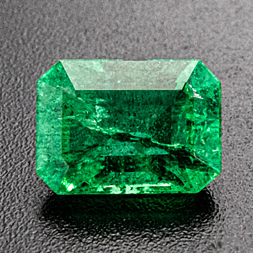 Emerald from Zambia. 1.62 Carat. Emerald Cut, distinct inclusions