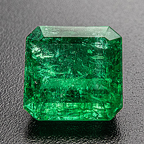 Emerald from Brazil. 1.81 Carat. Emerald Cut, very distinct inclusions