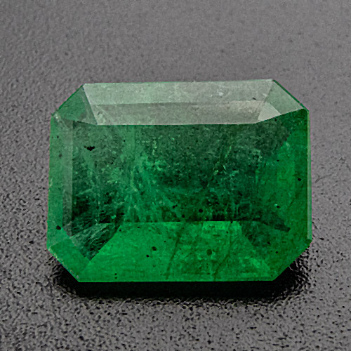 Emerald from Brazil. 2.52 Carat. Very good colour, very shallow cut  makes this gem look substantially heavier and much more expensive