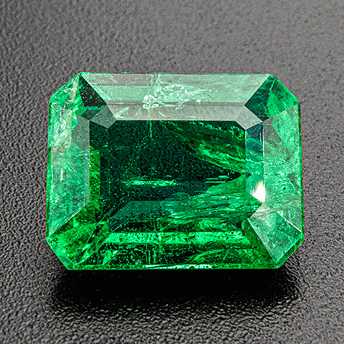 Emerald from Zambia. 3.3 Carat. Emerald Cut, distinct inclusions