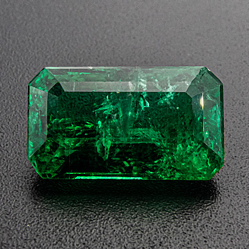 Emerald from Zambia. 3.93 Carat. Emerald Cut, very distinct inclusions