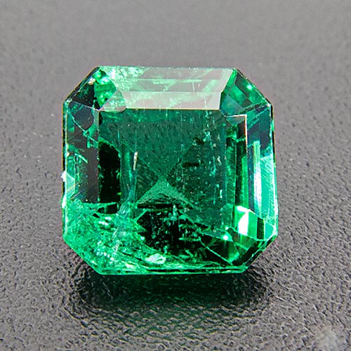 Emerald from Zambia. 0.84 Carat. Emerald Cut, distinct inclusions