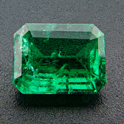 Emerald from Zambia. 0.92 Carat. Emerald Cut, very distinct inclusions