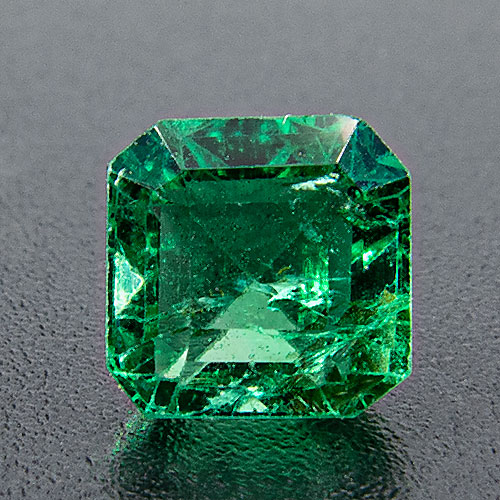 Emerald from Zambia. 0.97 Carat. Emerald Cut, distinct inclusions
