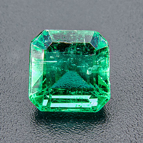 Emerald from Zambia. 0.97 Carat. Emerald Cut, very distinct inclusions