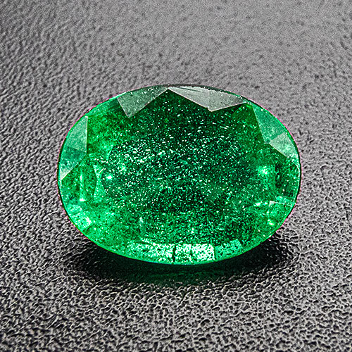 Emerald from Zambia. 1.01 Carat. Oval, very distinct inclusions